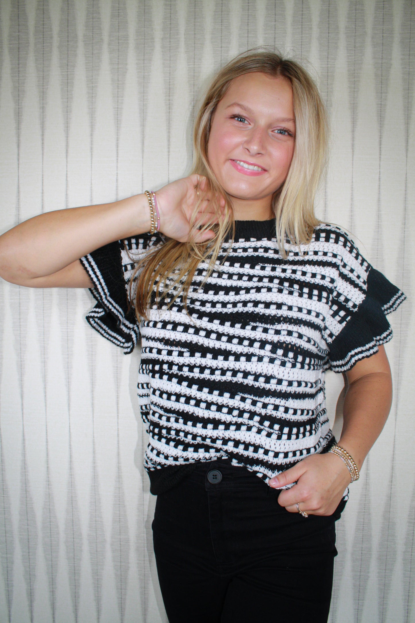 Black and white ruffle sleeve top